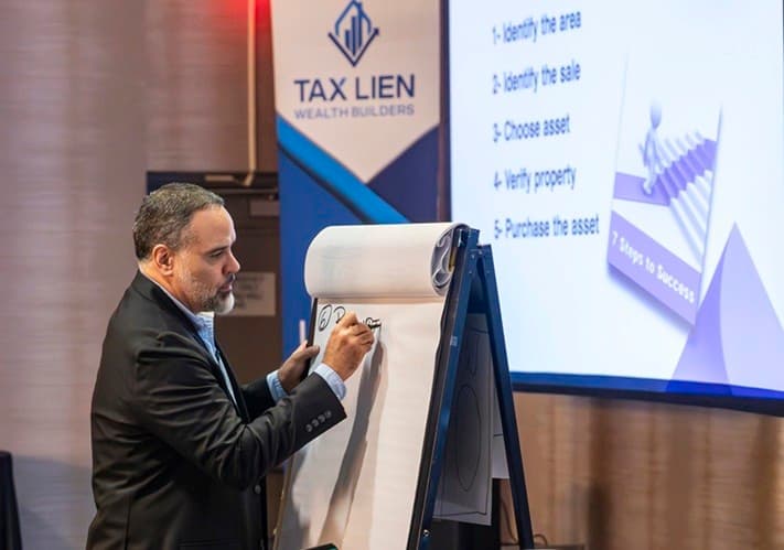 Real estate investment coach speaking at a real estate seminar